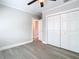 Bedroom with spacious closet and access to hallway at 5918 N Eustace Ave, Tampa, FL 33604