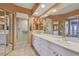 Double vanity bathroom with shower and nautical theme at 6450 Shoreline Dr # 9502, St Petersburg, FL 33708