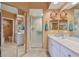 Bathroom with shower, double vanity and walk-in closet at 6450 Shoreline Dr # 9502, St Petersburg, FL 33708