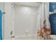 Clean bathroom with white tiled walls and a shower/tub combo at 6450 Shoreline Dr # 9502, St Petersburg, FL 33708