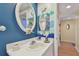 Charming bathroom with unique decor and a white vanity at 6450 Shoreline Dr # 9502, St Petersburg, FL 33708