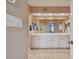 Double vanity bathroom with a large mirror and shower at 6450 Shoreline Dr # 9502, St Petersburg, FL 33708