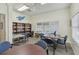 Community library with tables and chairs at 6450 Shoreline Dr # 9502, St Petersburg, FL 33708