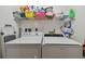Functional laundry room with washer and dryer hookups at 6450 Shoreline Dr # 9502, St Petersburg, FL 33708