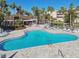 Community pool with lounge chairs and surrounding landscaping at 6450 Shoreline Dr # 9502, St Petersburg, FL 33708