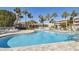 Refreshing community pool area with surrounding lounge chairs at 6450 Shoreline Dr # 9502, St Petersburg, FL 33708