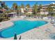 Community pool and spa with lounge chairs at 6450 Shoreline Dr # 9502, St Petersburg, FL 33708