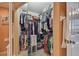 Large walk-in closet with ample hanging space and shelving at 6450 Shoreline Dr # 9502, St Petersburg, FL 33708