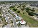 Aerial view of house and neighborhood at 676 Allegheny Dr, Sun City Center, FL 33573