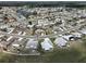 Aerial view of the neighborhood and property at 676 Allegheny Dr, Sun City Center, FL 33573