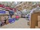 Unfinished attic with shelving and storage space at 676 Allegheny Dr, Sun City Center, FL 33573
