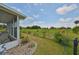 Backyard with screened porch and golf course view at 676 Allegheny Dr, Sun City Center, FL 33573