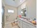 Clean bathroom with granite countertop and walk-in shower at 676 Allegheny Dr, Sun City Center, FL 33573