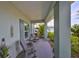Relaxing front porch with rocking chairs and a welcoming atmosphere at 676 Allegheny Dr, Sun City Center, FL 33573