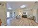 Spacious living room with hardwood floors and an open floor plan at 676 Allegheny Dr, Sun City Center, FL 33573