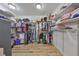 Large walk-in closet with ample shelving and hanging space at 676 Allegheny Dr, Sun City Center, FL 33573