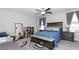 Bright bedroom with large bed and ceiling fan at 7153 Samuel Ivy Dr, Tampa, FL 33619