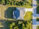 Single-Gathering home aerial view, showcasing roofline and landscaping at 7258 Bridgeport Ln, Englewood, FL 34224