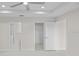 Spacious bedroom with access to bathroom and walk-in closet at 7258 Bridgeport Ln, Englewood, FL 34224