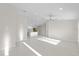 Bright and airy living room with high ceilings and recessed lighting at 7258 Bridgeport Ln, Englewood, FL 34224