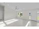 Spacious living area with tile flooring and lots of natural light at 7258 Bridgeport Ln, Englewood, FL 34224