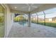 Relaxing pool area with covered patio and screened enclosure at 7258 Bridgeport Ln, Englewood, FL 34224