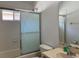 Clean bathroom with shower/tub combo and vanity at 8408 Canterbury Lake Blvd, Tampa, FL 33619
