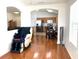 Living room with hardwood floors and view of kitchen at 8408 Canterbury Lake Blvd, Tampa, FL 33619