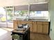 Outdoor kitchen with granite countertops and gas cooktop at 8408 Canterbury Lake Blvd, Tampa, FL 33619