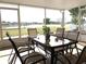 Screened porch overlooking lake and backyard at 8408 Canterbury Lake Blvd, Tampa, FL 33619