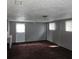Spacious basement with neutral-colored walls and carpet at 905 10Th Sw St, Ruskin, FL 33570