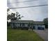 Ranch-style home with a spacious yard and detached garage at 905 10Th Sw St, Ruskin, FL 33570