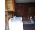 Laundry area with washer, dryer, and storage cabinets at 905 10Th Sw St, Ruskin, FL 33570