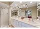 Double vanity bathroom with a shower and updated fixtures at 960 Starkey Rd # 5301, Largo, FL 33771