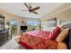 Spacious bedroom with a king-size bed and private balcony at 960 Starkey Rd # 5301, Largo, FL 33771