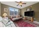 Relax in this condo's comfortable living room, featuring hardwood floors at 960 Starkey Rd # 5301, Largo, FL 33771