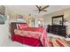 Main bedroom with king-size bed, dresser, and access to the bathroom at 960 Starkey Rd # 5301, Largo, FL 33771