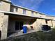 Backyard patio with covered area, grill, and AC unit at 9822 Carlsdale Dr, Riverview, FL 33578
