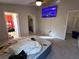 Main bedroom with carpeted floor, walk in closet, and attached bathroom at 9822 Carlsdale Dr, Riverview, FL 33578