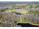 Aerial view of community with park, pond, and walking paths at 12113 Marblehead Dr, Tampa, FL 33626
