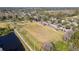 Aerial view of community park with large open field at 12113 Marblehead Dr, Tampa, FL 33626