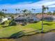 Beautiful home on a lakefront lot with lush landscaping at 12113 Marblehead Dr, Tampa, FL 33626