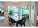Bright breakfast nook with view of pool and golf course at 12113 Marblehead Dr, Tampa, FL 33626