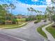 Gated community entrance to Harbor Links, with lush landscaping at 12113 Marblehead Dr, Tampa, FL 33626