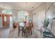 Charming dining room with wood table and chandelier at 12113 Marblehead Dr, Tampa, FL 33626