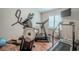Home gym with a treadmill and elliptical for your fitness needs at 12113 Marblehead Dr, Tampa, FL 33626