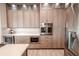 Modern kitchen with stainless steel appliances and ample wood cabinetry at 12113 Marblehead Dr, Tampa, FL 33626