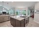 Spacious kitchen with large island, stainless steel appliances, and ample cabinetry at 12113 Marblehead Dr, Tampa, FL 33626