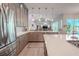 Modern kitchen with stainless steel appliances and expansive island at 12113 Marblehead Dr, Tampa, FL 33626