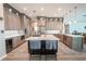 Modern kitchen with large island, stainless steel appliances, and white quartz countertops at 12113 Marblehead Dr, Tampa, FL 33626